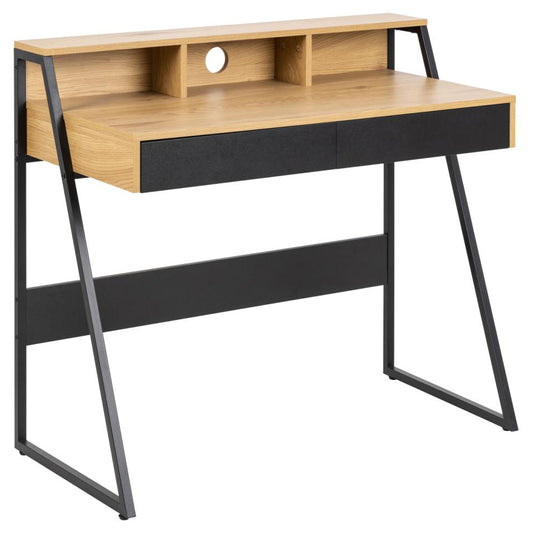 Reece Ricco office desk with a melamine tabletop in wild oak, black drawers, and a black metal base, featuring an open shelf and metal runners.