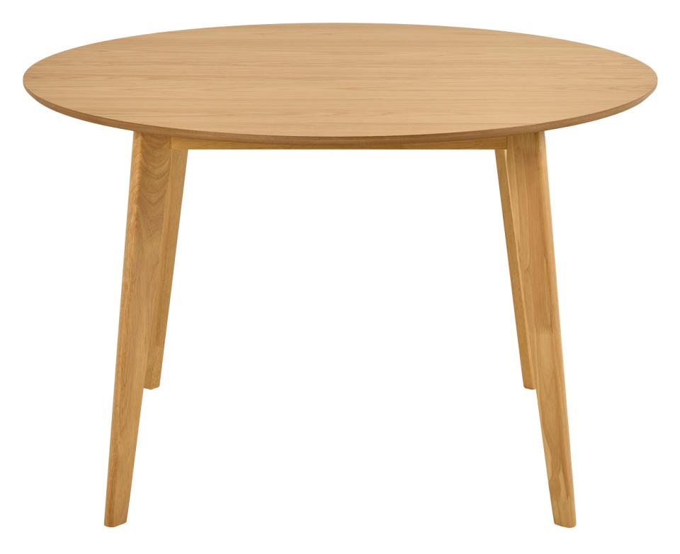 A round wooden dining table with a light natural oak finish and four tapered legs, shown against a plain white background.