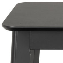 Load image into Gallery viewer, Black wooden table corner on a white background
