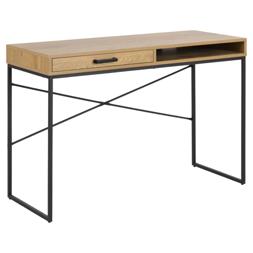 A rectangular oak desk with a black metal base and a drawer, featuring a wild oak look and a wire hole at the back. The desk has a modern appearance with clean lines and a cubic hole for storage.
