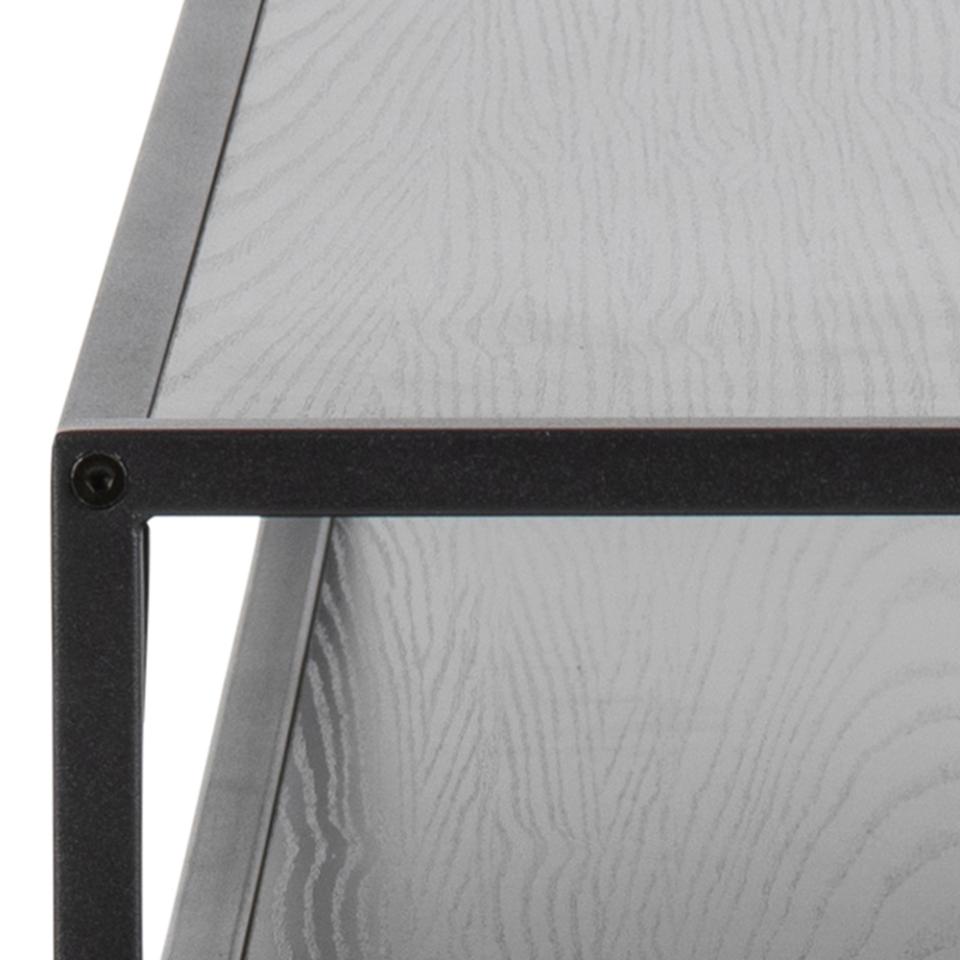 Close-up of a corner where a black metal frame meets a textured gray surface.