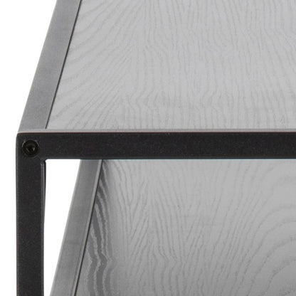 Close-up of a corner where a black metal frame meets a textured gray surface.