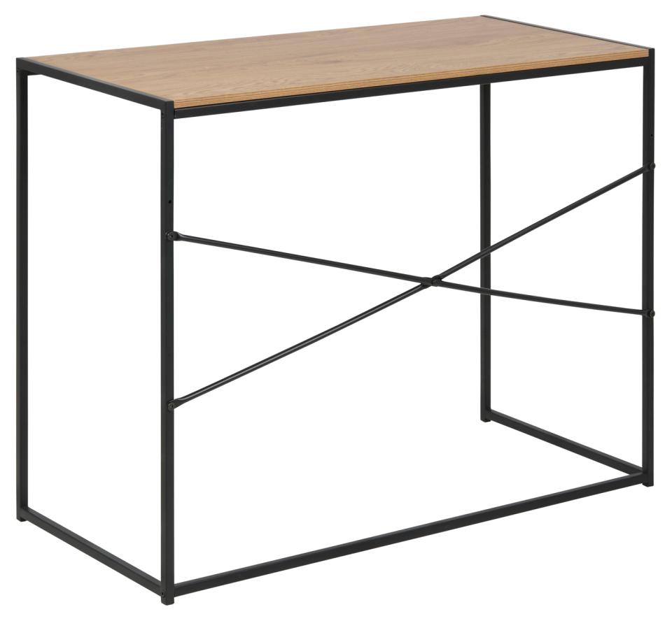 Small table with wooden top and black metal frame on a white background
