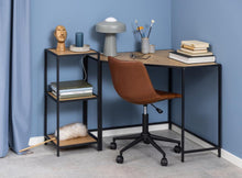 Load image into Gallery viewer, Corner desk with a chair against a blue wall
