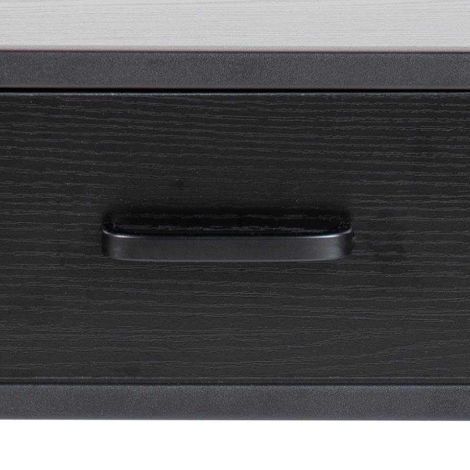 Close-up of a dark wood drawer front with a black horizontal pull handle and a light wood top edge visible above.