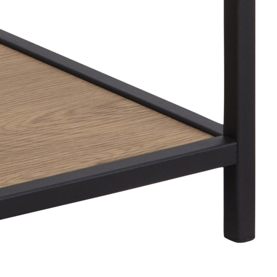 Close-up of a black metal frame with a wooden surface on a white background
