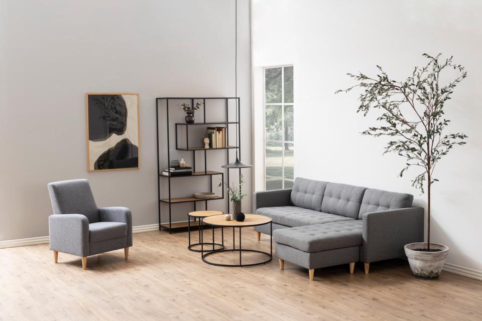 A large seaford bookcase by Hommestreet in a modern room set with a grey sofa and a spiro coffee table set