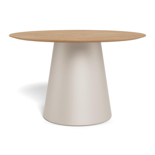 A modern round dining table featuring a light oak wood top and a tapered, matte off-white pedestal base, shown on a clean white background.