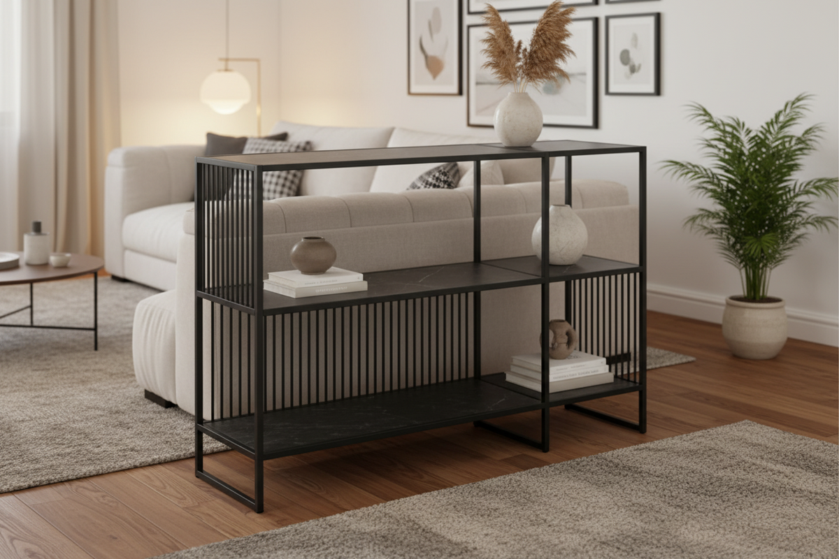 Black metal console table with open shelves on a white background