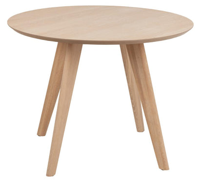 Round wooden Townsville dining table with four legs on a white background