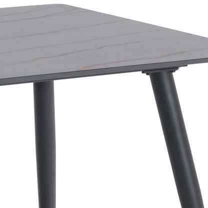 Gray outdoor table with black metal legs on a white background