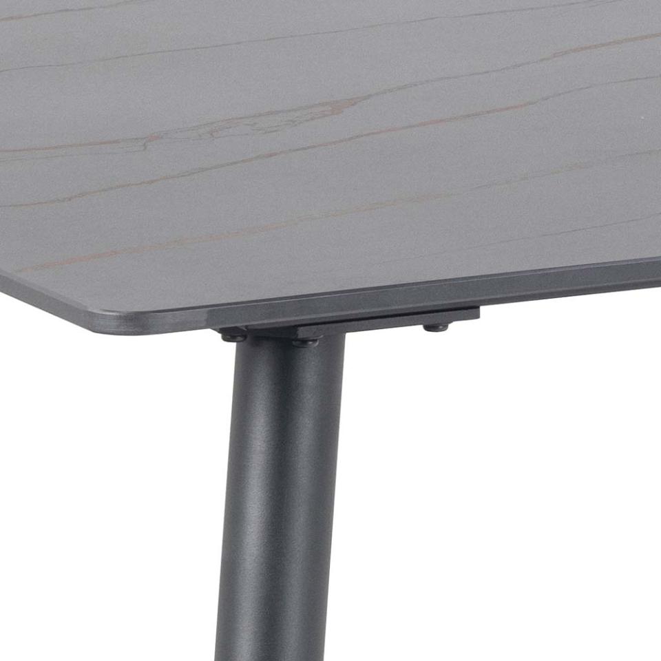 Gray table with a visible leg on a white background