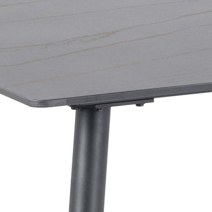 Gray table with a visible leg on a white background