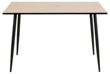 Load image into Gallery viewer, A rectangular table with a light natural wood grain tabletop and four tapered black metal legs, shown against a plain white background.
