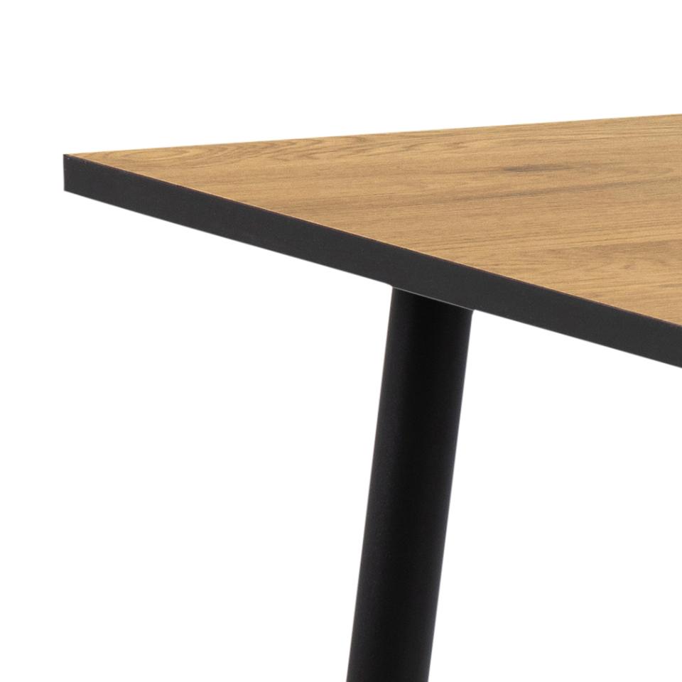 Wooden table with black metal legs on a white background