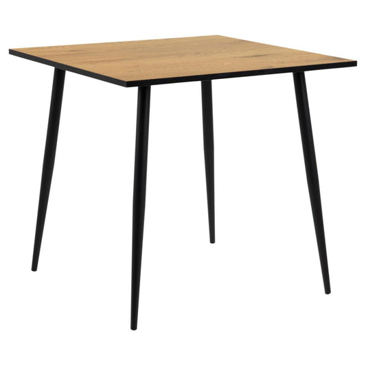 A square dining table with a light brown wood-grain top and four tapered black metal legs, shown against a plain white background.