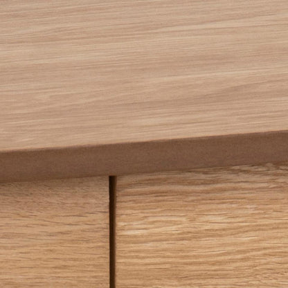 Close-up of a wooden surface with a visible grain pattern