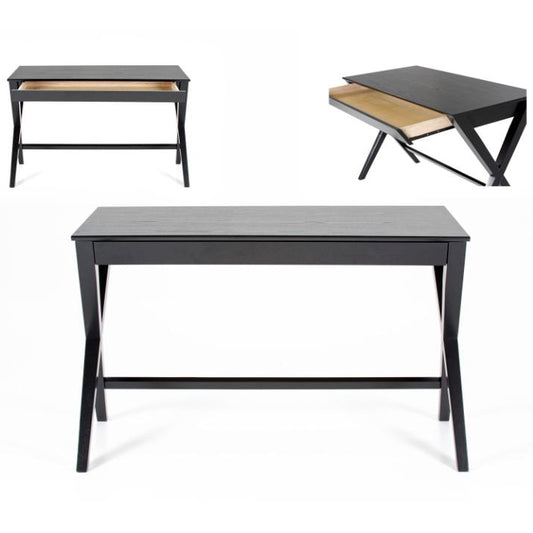A black rectangular office desk with a large top and a drawer, featuring X-shaped legs and a metal runner. The desk is made of AC lacquered oak veneer and rubberwood.