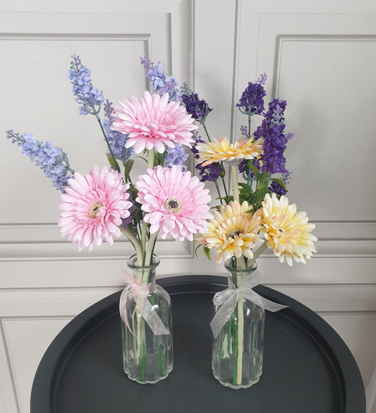 Gerberas And Lavender Artificial Flowers In a Clear Glass Bottle Vase Vintage Home Decor