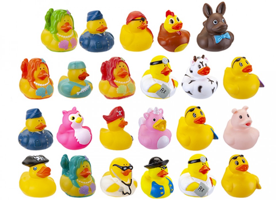 A collection of various rubber ducks in different colors and disguises, intended for party favors or games.