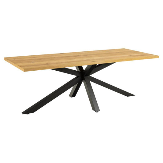 A rectangular oak dining table with a matte black metal base.