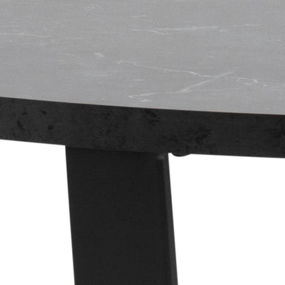close up of a dining table top and leg on a white background