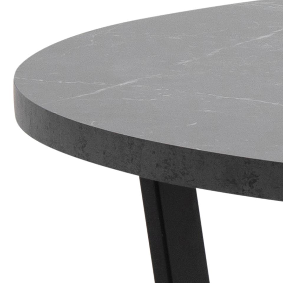 close up of an Amble dining table top and leg on a white background