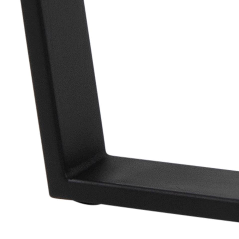 close up of a metal leg of a dining table