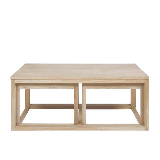 A set of three white oak veneer coffee tables of varying sizes, with a rectangular main table and two smaller side tables.