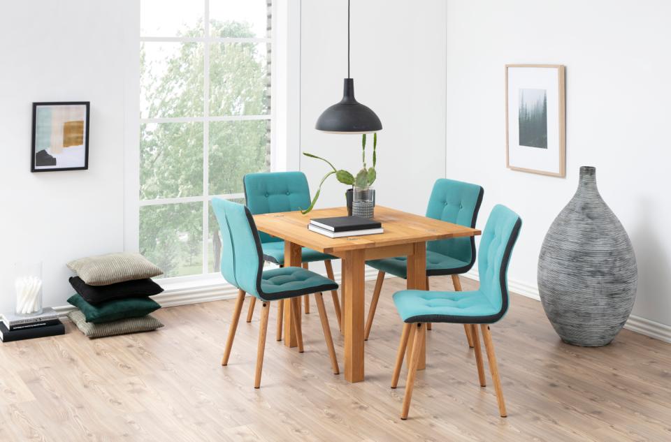 kenley oak folding dinging table by Homestreet in a modern dining room