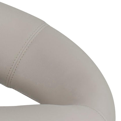 Close up of a taupe Plump faux leather bar stool on a white background