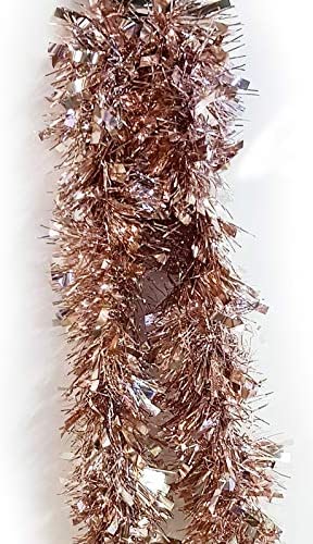 2 metre rose gold christmas tinsel by Homestreet on a white ba